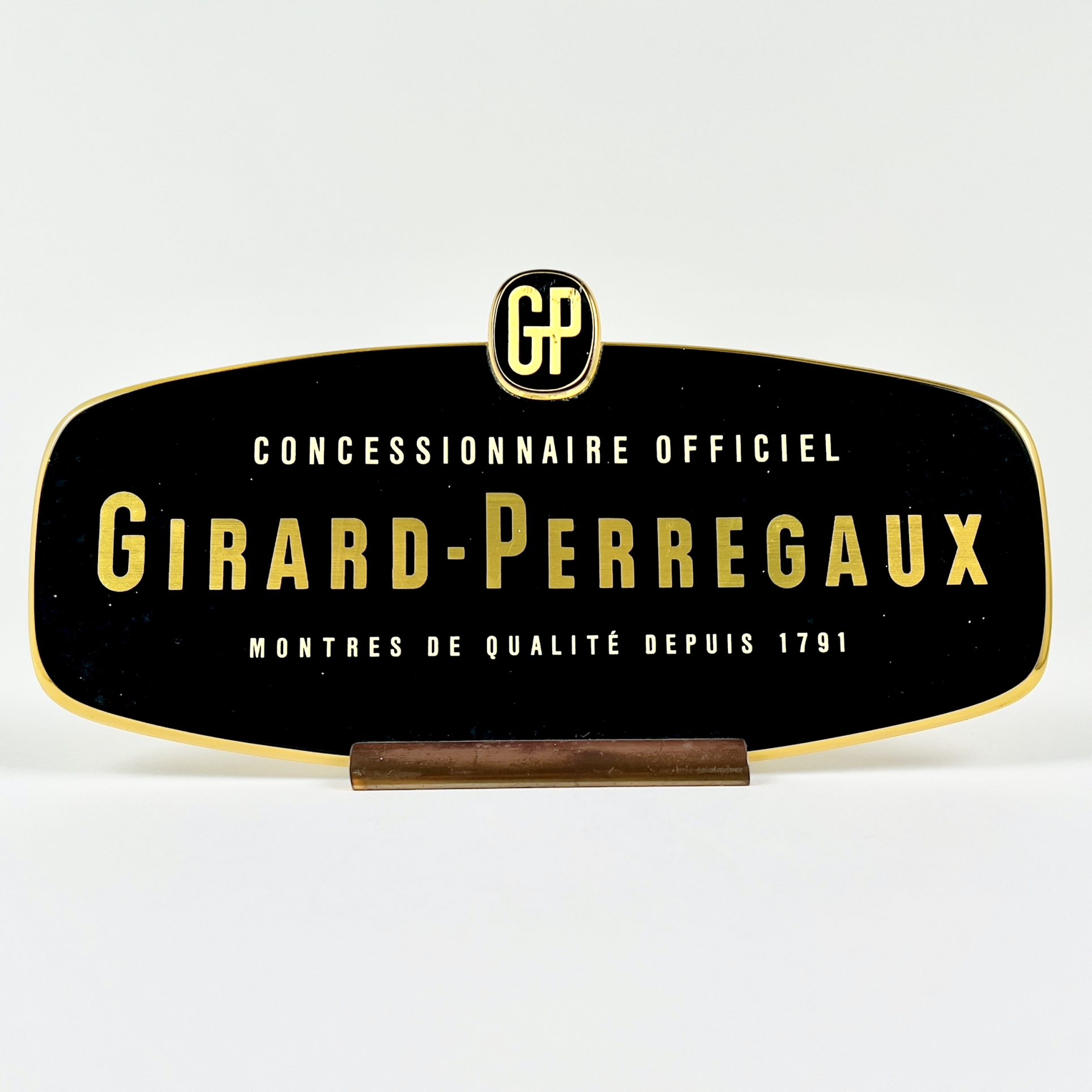 PLAQUE PUBLICITAIRE GIRARD PERREGAUX CIRCA 1960